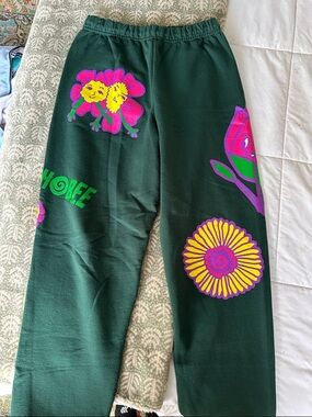 Okeechobee Green Sweatpants with Colorful Floral Graphics